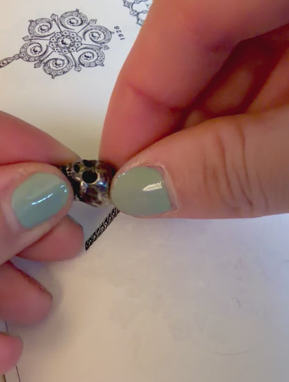 Vintage Silver Articulated Skull Charm